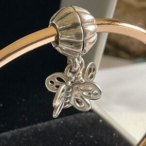 A pair of Pandora butterflies dangling Friends for Ever charm